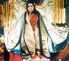 Mata Nirmala Devi decorated with saris Mata Nirmala Devi decorated with saris