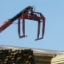crane above materials in builders' merchant's yard crane above materials in builders' merchant's yard